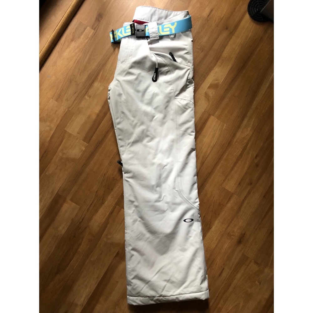 Women’s Oakley snowboarding pants and Oakley belt